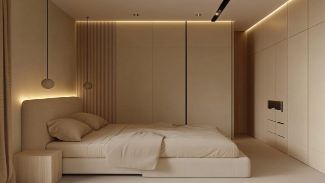 Camera da letto moderna con illuminazione soffusa e arredo minimal.