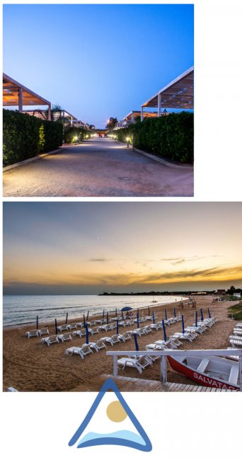 Spiaggia al tramonto con lettini e passerella.